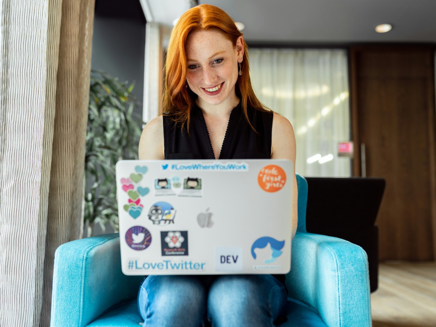 A professional working on a laptop
